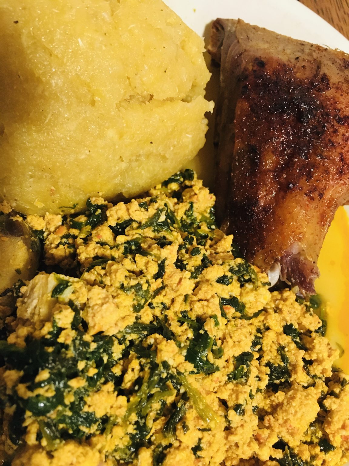 Garri and Egusi soup with grilled chicken Dr Sango